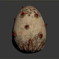 Artistic Egg Shaped Sculpture Carving with Red Spots Spikes and Textured Surface