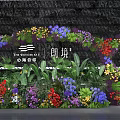 Vibrant Floral Art Installation Featuring Colorful Flowers And Lush Green Plants