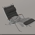 Comfortable Gray Lounge Chair With Padded Seat Wooden Armrests And Fluffy Blanket