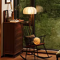 Cozy Wooden Rocking Chair With Pillow And Moon Decor By Window With Green View