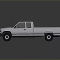 Silver Extended Cab Pickup Truck With Shiny Surface On Black Background