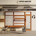 Coffee Monster 24 Hour Cafe Diner Storefront Featuring Windows Tables Chairs And Blackboard Menu