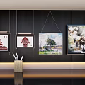 Different Style Paintings Hanging On Dark Wall With Light Decorative Line And Pen Holder