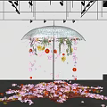 Floral Sculpture Installation with Hanging Colorful Flowers and Umbrella Like Structure and Scattered Petals on Floor