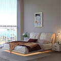Double Bed With White Headboard Brown Blanket Pink Pillows Framed Painting Sunlight And Sea View