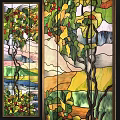 Stained Glass Window with Vines Leaves Berries and Scenic Landscape Design