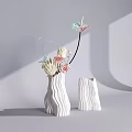 White Ceramic Vases With Wavy Texture Decorative Flowers Ornamental Hoops And Blooms In Grey Background