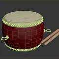 Traditional Red Drum With White Head Golden Decorations And Wooden Drumsticks