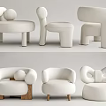 Modern Upholstered Single Seater Sofa Designs With Curved Shapes Bow Detail And Wooden Legs