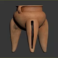 Ancient Terracotta Vessel With Tripod Legs Side Handle And Textured Surface
