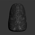 Black Stone Sculpture With Intricate Glowing Green Pattern And Decorative Design