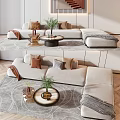 Light Beige Sectional Sofa With Decorative Pillows Green Plants And Round Coffee Tables