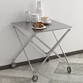 Stainless Steel Folding Coffee Table With Wheels And Coffee Cup Croissant Jars
