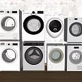 Modern Front Loading Washing Machines Displayed Against Brick Wall Wooden Floor