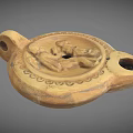 Ancient Clay Ceramic Artifact With Carved Figure And Symmetrical Holes Design