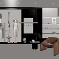 Stylish Modern Clothing Store Interior With Hanging Clothes Mannequins And Brown Armchair