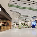 Modern Shopping Mall Lobby With Curved Ceiling Green Pillars Escalators And Polished Floor