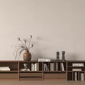 Wooden Bookshelf With Layered Design Holding Books Decorative Vase And Sculptures