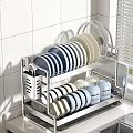 Stainless Steel Dish Drying Rack With Plates Bowls And Cups On Kitchen Countertop