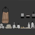 Bathroom Daily Essentials With Towels Soap Dispensers Lotion Bottles And Toothbrushes