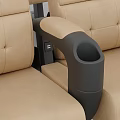 Beige Seats With Black Armrests And Bases Neatly Arranged On Gray Floor Against White Wall