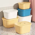 Colorful Lidded Plastic Storage Boxes Stacked Yellow White And Blue For Home Organization