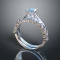 Elegant Platinum Diamond Ring With Central Stone And Side Accent Diamonds