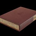 Brown Leather Bound Book With Circular Emblem On Cover And Vintage Pages