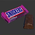 Classic Snickers Chocolate Bar Wrapped Package and Unwrapped Tasty Sweet Snack