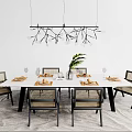 Modern Dining Table Set With Rattan Chairs Branch Shaped Chandelier Tableware And Green Plant