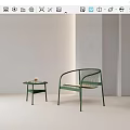Green Metal Frame Lounge Chair With Woven Seat And Side Table In Minimalist Interior