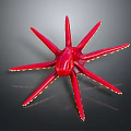 Vibrant Red Starfish With Long Yellow Tipped Arms On Dark Background
