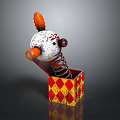Clown Pop Up Toy With White Red Body In Red Yellow Checkered Box