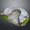 Ancient Circular Stone Ruins With Grass Covered Ground And Weathered Edges