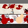 Reception Desk With Red Beige Paper Fans Decorations Plants And Lighting