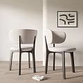 Minimalist Contemporary Dining Chairs With Light Fabric Seats Dark Wooden Legs And Curved Backrests