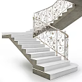 Elegant Staircase With Marble Steps And Ornate Metal Railings With Intricate Patterns