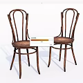 Classic Wooden Dining Chairs With Curved Backrests Round Seats And Vintage Style