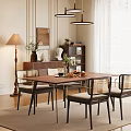 Elegant Modern Dining Room Interior With Wooden Table Wicker Chairs Decorative Plants And Floor Lamp