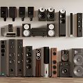 Diverse Home Audio Speakers With Various Designs Sizes And Sound Systems