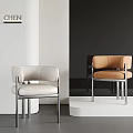 Modern White And Orange Dining Chairs With Metal Frame In Contemporary Showroom