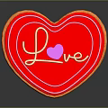 Heart Shaped Red Cookie Decorated With Love Lettering And Pink Heart