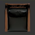 Traditional Wooden Chair With Intricate Carved Backrest And Black Cushioned Seat
