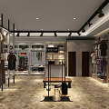 Modern Clothing Store Interior With Clothing Racks Displayed Garments And Seating Area