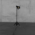 Modern Black Floor Lamp With Tripod Base Adjustable Head And Gray Concrete Wall