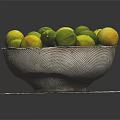 Fresh Limes and Lemons in Metal Colander Bowl on White Paper