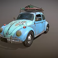 Vintage Blue Volkswagen Beetle With Roof Rack And Decorative Emblems