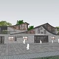 Modern Tourist Center With Gray Brick Exterior Large Windows Sloped Roof And Tree Surrounded Plaza