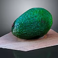 Ripe Fresh Green Avocado With Rough Texture On Wooden Cutting Board