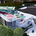 Modern Kindergarten Building With Colorful Roof Green Lawn And Play Facilities
